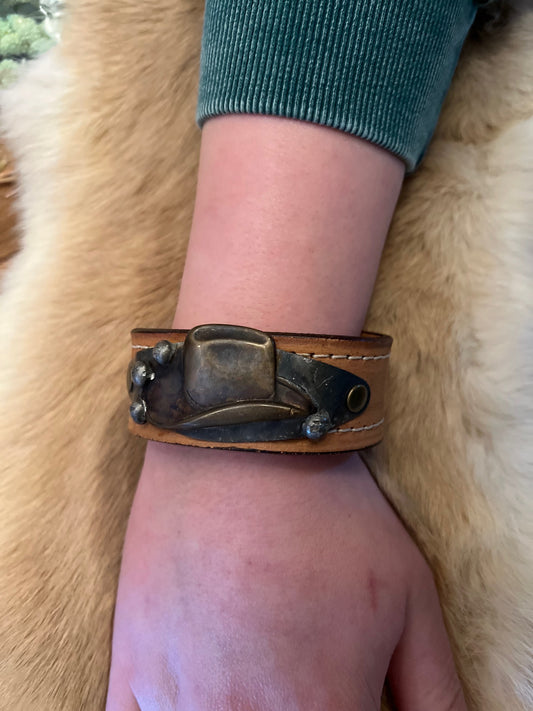 Leather cuff w/brass Hat
