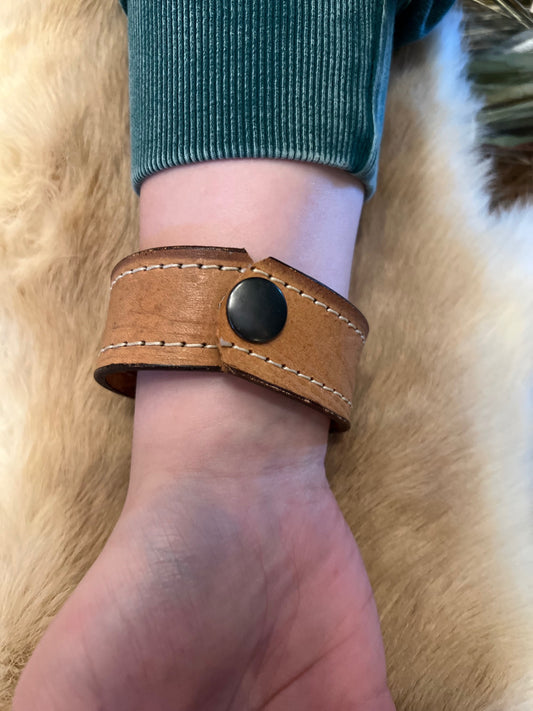 Leather cuff w/brass Hat
