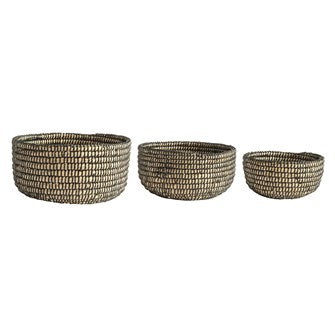 The Hand-Woven Grass Baskets in Natural & Black colors are perfect for displaying fruit, your favorite Boho bangles, or keeping a place for your tv remote. Comes in three sizes; each sold separately. Small: 6-3/4"Round x 3-1/2"H Medium: 8-1/4" Round x 4-1/4"H Large: 10" Round x 5"H