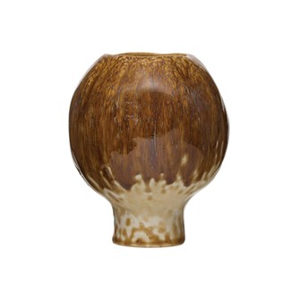 This 5" Round x 6"H Stoneware Pedestal Vase w/ Reactive Glaze and Ginger Color makes the perfect gift or add to your mantle or book shelf. (Each One Will Vary Slightly)