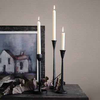 These Black Cast Iron Taper Holders are rugged and sturdy and make a great addition to any mantle or décor. Comes in 3 sizes. Small: 3-3/4" Round x 10-1/4"H Medium: 3-3/4" Round x 12-1/4"H Large: 3" Round x 14-1/4"H
