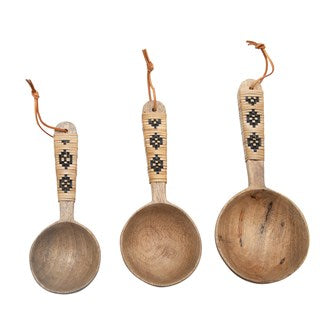 Add a touch of Boho to your next gathering and Kitchen décor with this 8-1/2"L, 7-1/2"L & 7"L Mango Wood Scoops w/ Patterned Rattan Wrapped Handles & Leather Ties. Comes as a Set of 3 in Drawstring Bag. Makes a great gift for the friend who loves to cook.