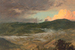Mountains in Clouds with Bright Sunset