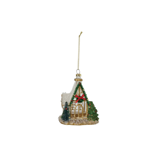 Christmas ornament shaped like a small house with a red bow, trees, and snow on a white background.