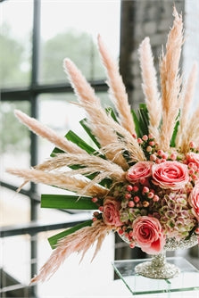 Our Pampas Grass faux stems are smooth and tan in color.  The stems are 25.5"-28" in length and come in packs of 6.  Makes the perfect addition to your favorite vase.