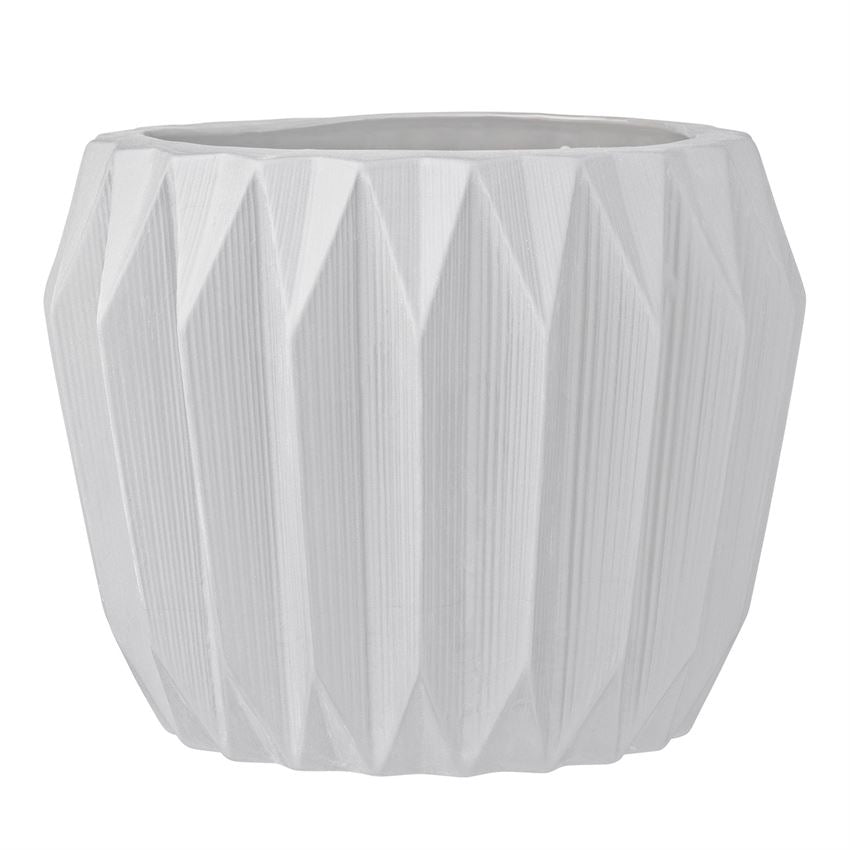 This 7-3/4" Round x 6"H Stoneware Fluted Flower Pot with a matte white finish is a favorite for so many looking for simple, elegant, and unique pottery to hold their favorite plant. Holds a 6" pot.