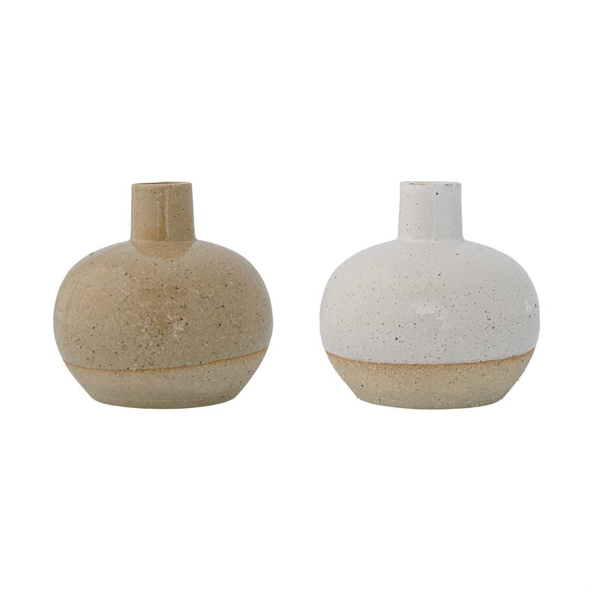 This Vase make the perfect gift. Each vase has a Sand Finish and comes in either a beige or white finish upper with a sand lower. Add to your collection.