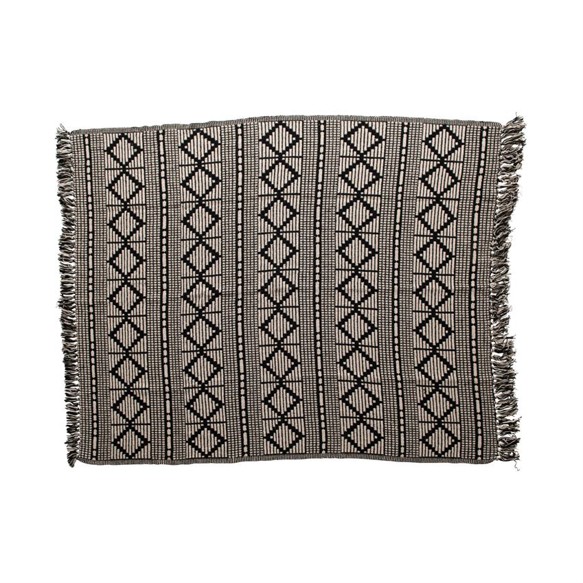 Adding this 60"L x 50"W Woven Recycled Cotton Blend Throw with Fringe in Black & Beige tone to your home décor will add a touch of Boho and layers to any room. Makes the perfect light wrap on a cool night around the fire pit.