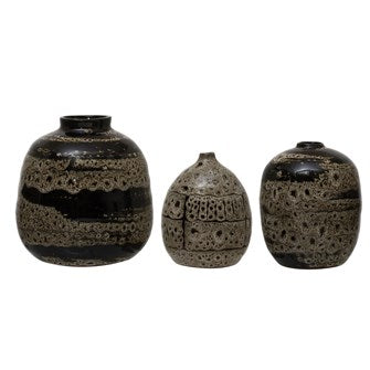 Fun and Unique are Terramania's Terra-cotta Vases with a Reactive Glaze Brown finish.  These make the perfect gift and comes in three sizes.  Small: 3" Round x 4.75"H Medium: 4" Round x 5"H Large: 4.75" Round x 6"H (Each One Will Vary)